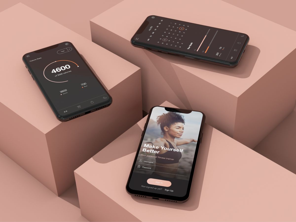 Mobile phones on pink boxes.