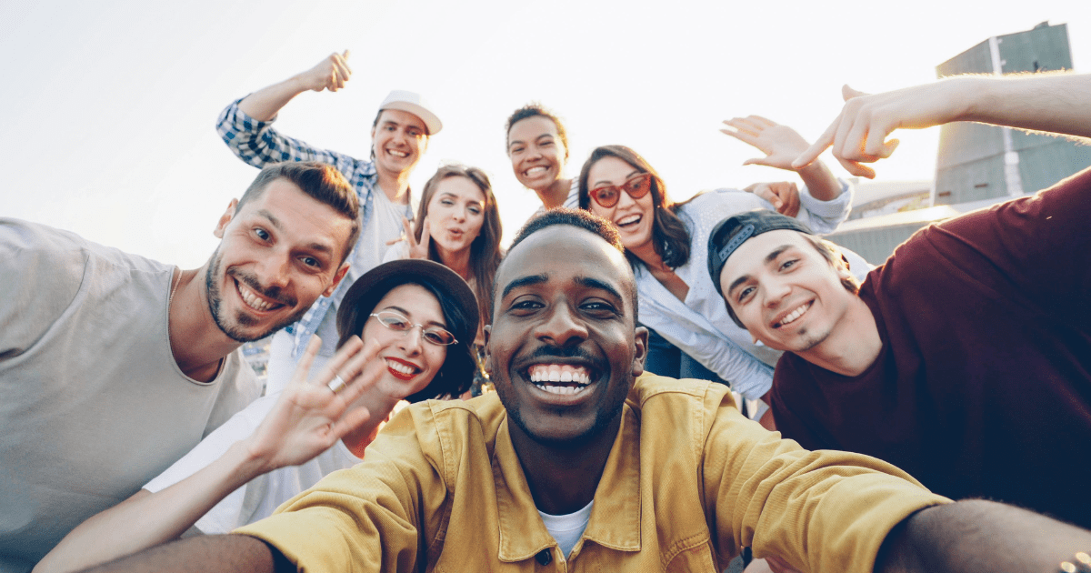 Group friends outside taking a selfie